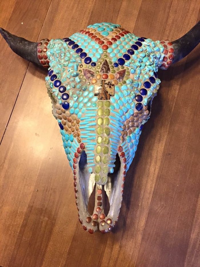 Cow bison skull with red creek jasper cross and three arrowheads