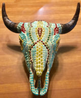 Bull bison with gaspeite, mahogany jasper, red arrowhead