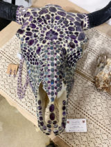 Cow buffalo skull with an amethyst stalactite slice