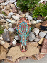 Bull skull with red jasper arrowhead