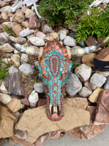 Bull skull with red jasper arrowhead